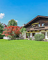 KITZIMMO-Baugrundstück mit Altbestand in Toplage auf der Bichlalm - Immobilien Kitzbühel.-1