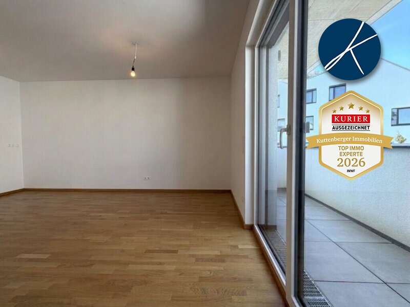 Wohn-/Essbereich mit Ausgang zum Balkon