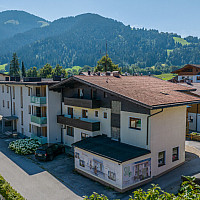 KITZIMMO-Grundstück mit Baugenehmigung für 5 Wohnungen - Immobilien Söll.