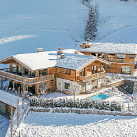 KITZIMMO-Luxuswohnung mit Pool in Toplage kaufen - Immobilie Jochberg.