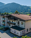 KITZIMMO-Grundstück mit Baugenehmigung für 5 Wohnungen - Immobilien Söll.